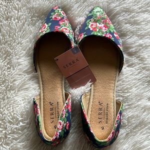 Cute floral flats. Never been worn.